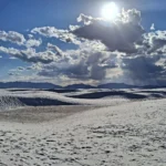 White gypsum dunes at White Sands in New Mexico under a wide sky
