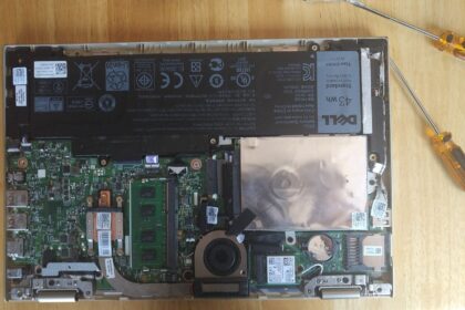 a tablet and laptop side by side on a study desk